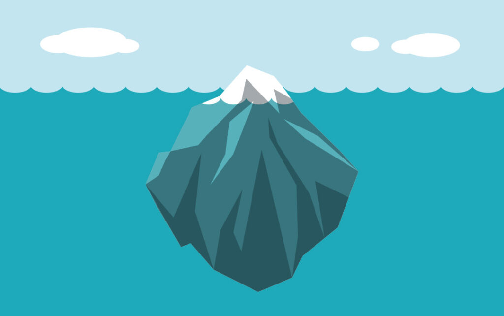 Illustration of an iceberg submerged in water. This is a side view so the viewer sees both the submerged part as well as the tip that exists above the surface.