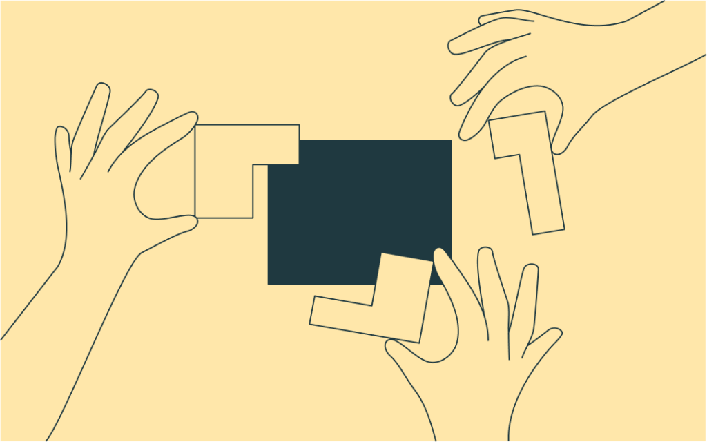 Three hands moving blocks around to create a whole, on a yellow background.